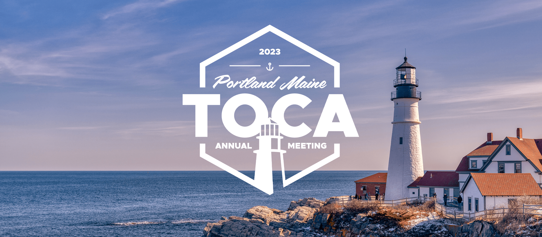 TOCA logo on a lighthouse scene in Maine