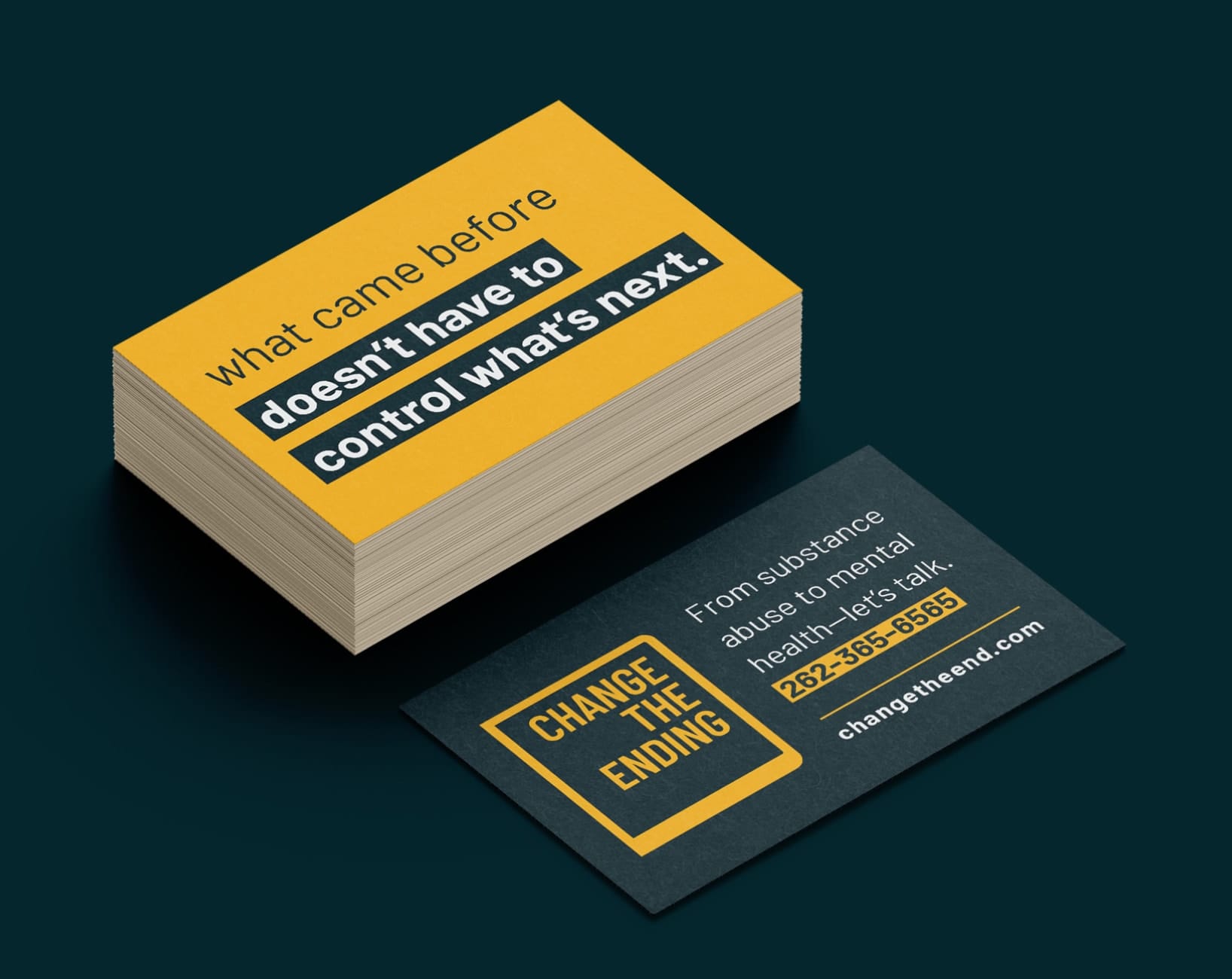 Business cards with one side saying, "what came before doesn't have to control what's next." and the other side saying "from substance abuse to mental health -let's talk"